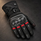 Gant moto chauffant réglable Calorix rouge — gros plan protection, commande et coutures