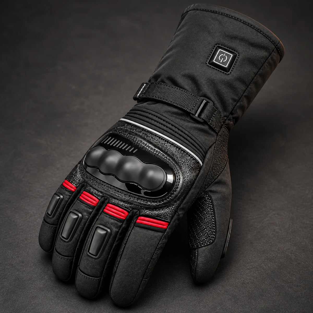 Gant moto chauffant trois niveaux Voltris rouge — gros plan protection, commande et coutures